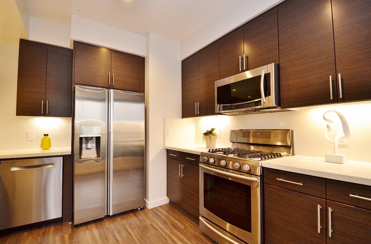 a view of the living room and dining area in a one bedroom suite at the loews